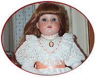Treasured Heirlooms Crochet logo: beautiful antique doll in custom-crocheted dress.