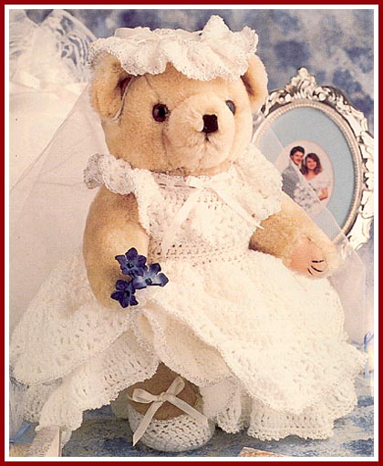Bridal Bear wears a gown crocheted of fingering weight baby yarn.