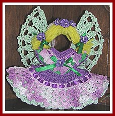 Violet the Easter Angel is crocheted on a gingerbread man cookie cutter base.