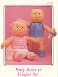 Annies Attic Bitty Baby is a 12-inch crocheted soft sculpture doll.